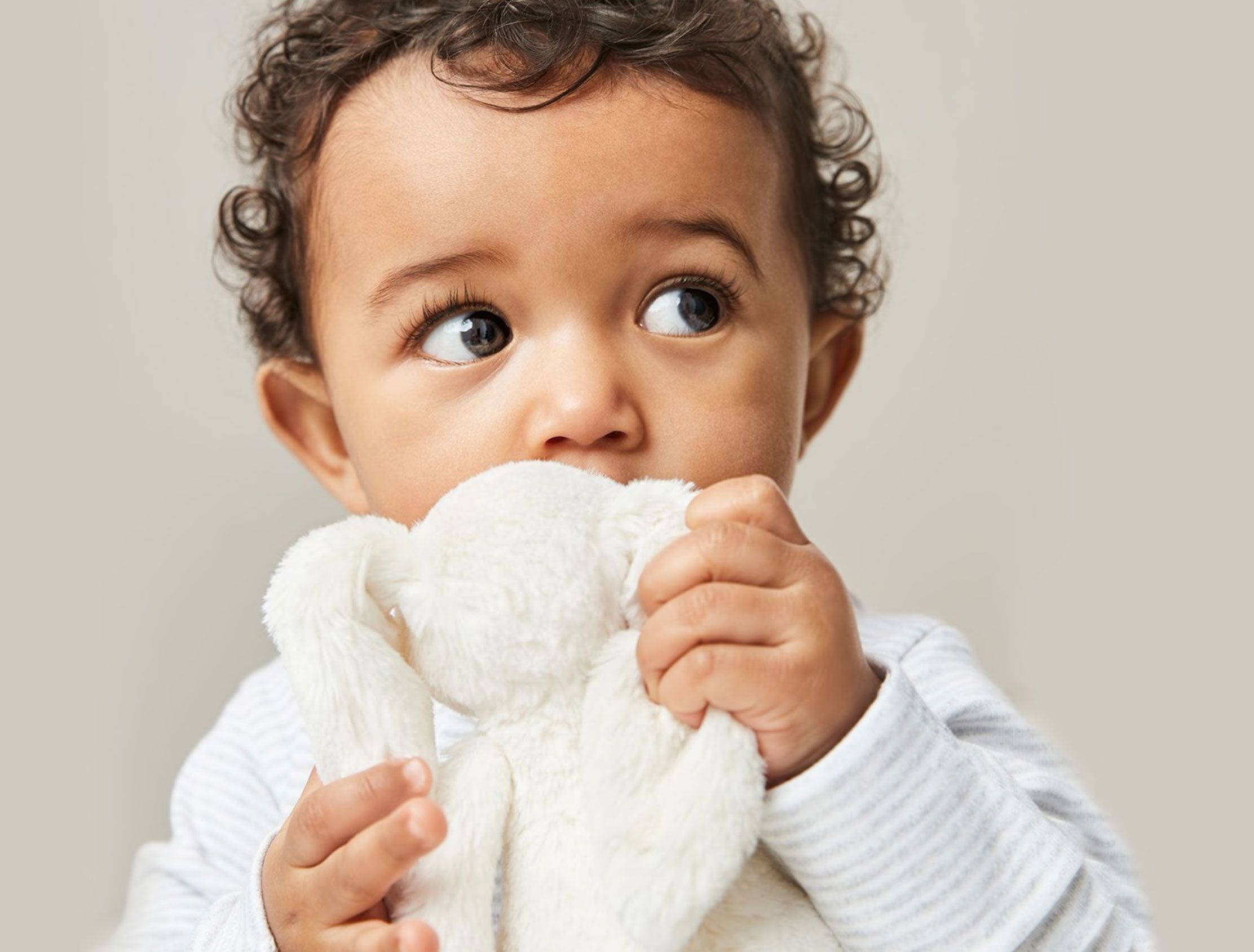 Baby holding a towel