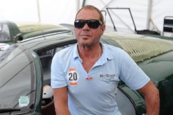 US actor and producer Chad McQueen, son of US actor Steve McQueen, poses while sitting on a 1966 Porsche 906 in a paddock of the Le Mans circuit on July 6, 2014, in Le Mans, western France. Chad McQueen has returned to Le Mans during the classic race event for the making of a movie documentary entitled "McQueen: The Man and Le Mans" from Gabriel Clarke and John McKenna, 44 years after his father participated in the 24 hours of Le Mans. AFP PHOTO / JEAN-FRANCOIS MONIER        (Photo credit should read JEAN-FRANCOIS MONIER/AFP via Getty Images)