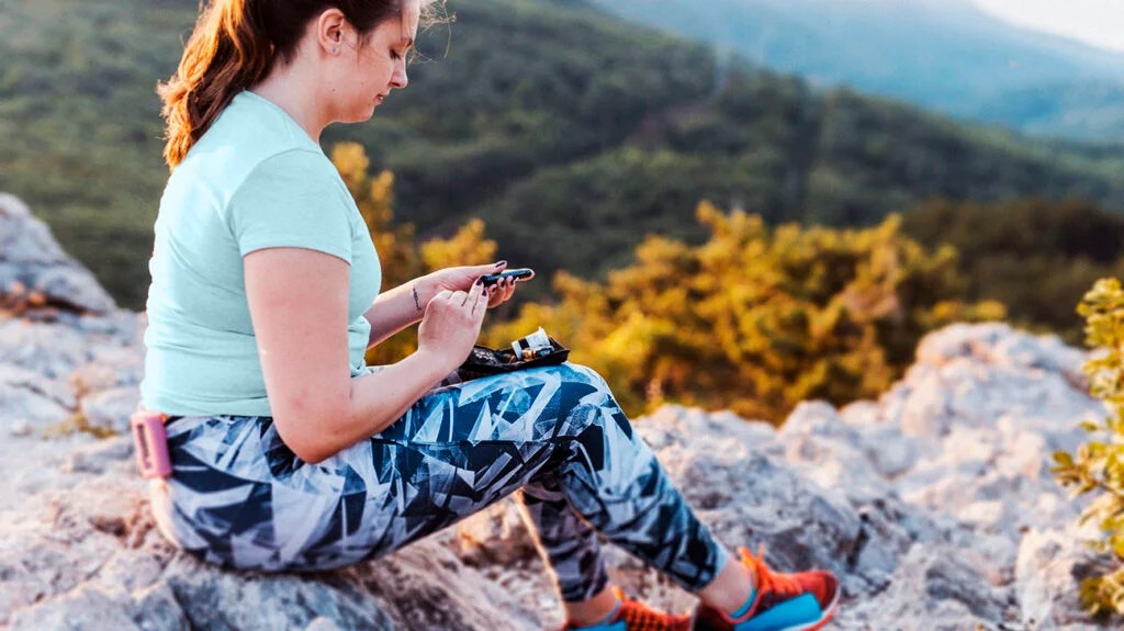 A female checking her blood sugar.