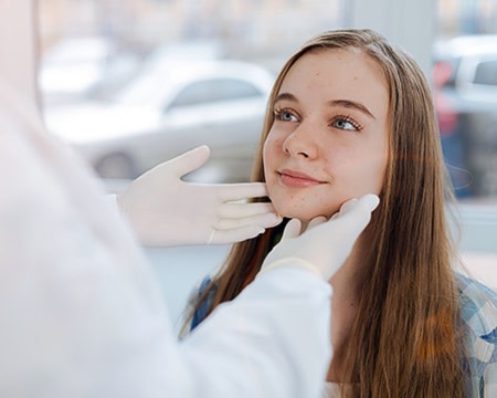 Female adolescent with papules