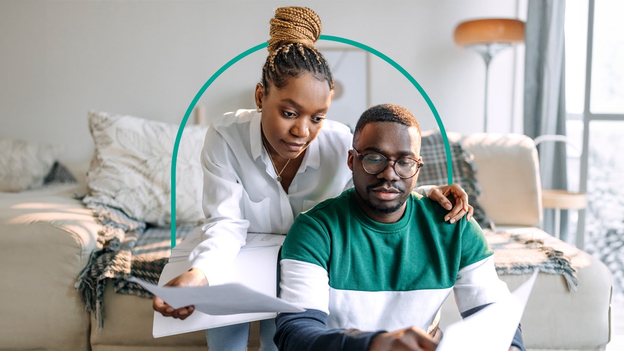 design image of a couple looking at some papers