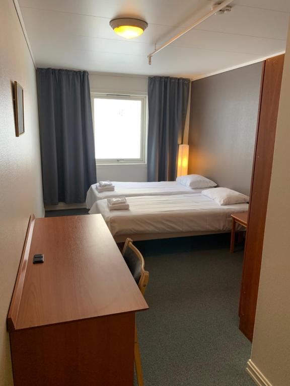 Krevet ili kreveti u jedinici u okviru objekta Narvik Budget Rooms