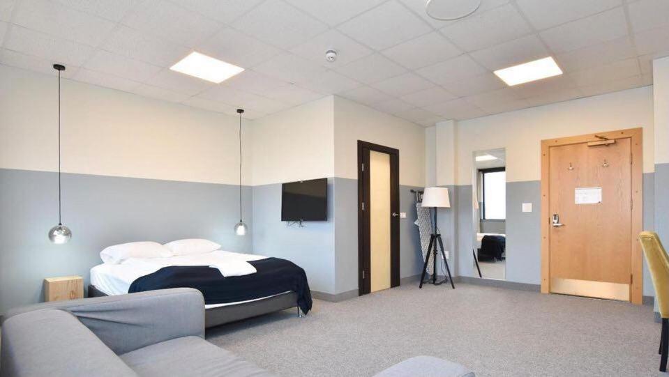 A bed or beds in a room at ABC Hotel by Reykjavik Keflavik Airport