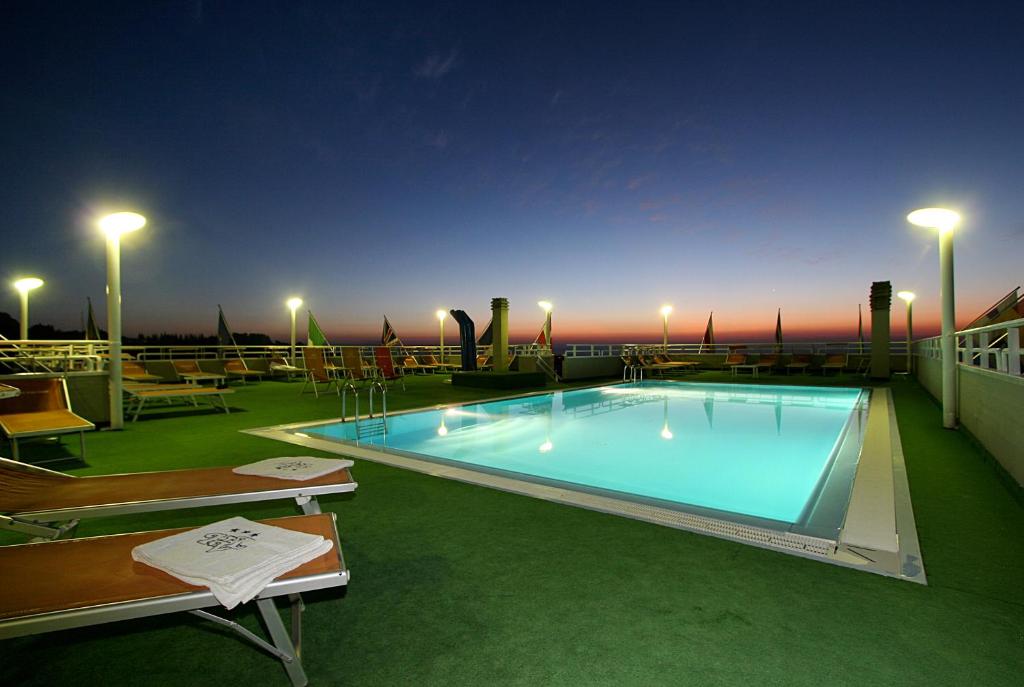 a large swimming pool on top of a building at Hotel Villa Luca in Chianciano Terme