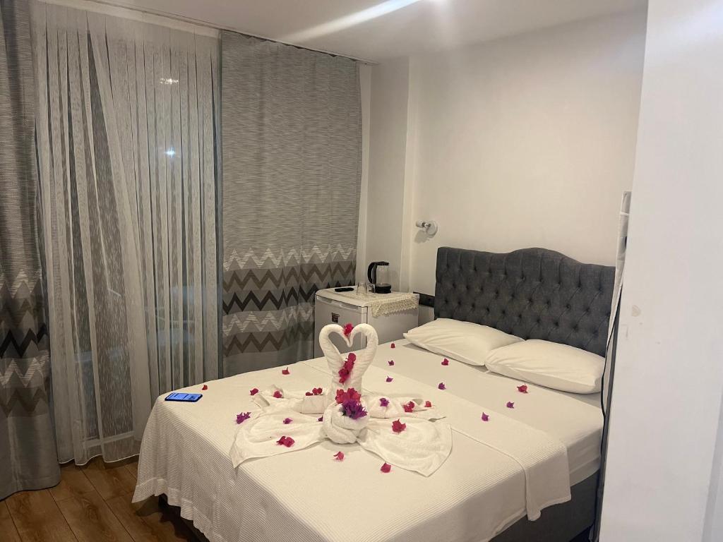 Lova arba lovos apgyvendinimo įstaigoje Side Boutique Hotel