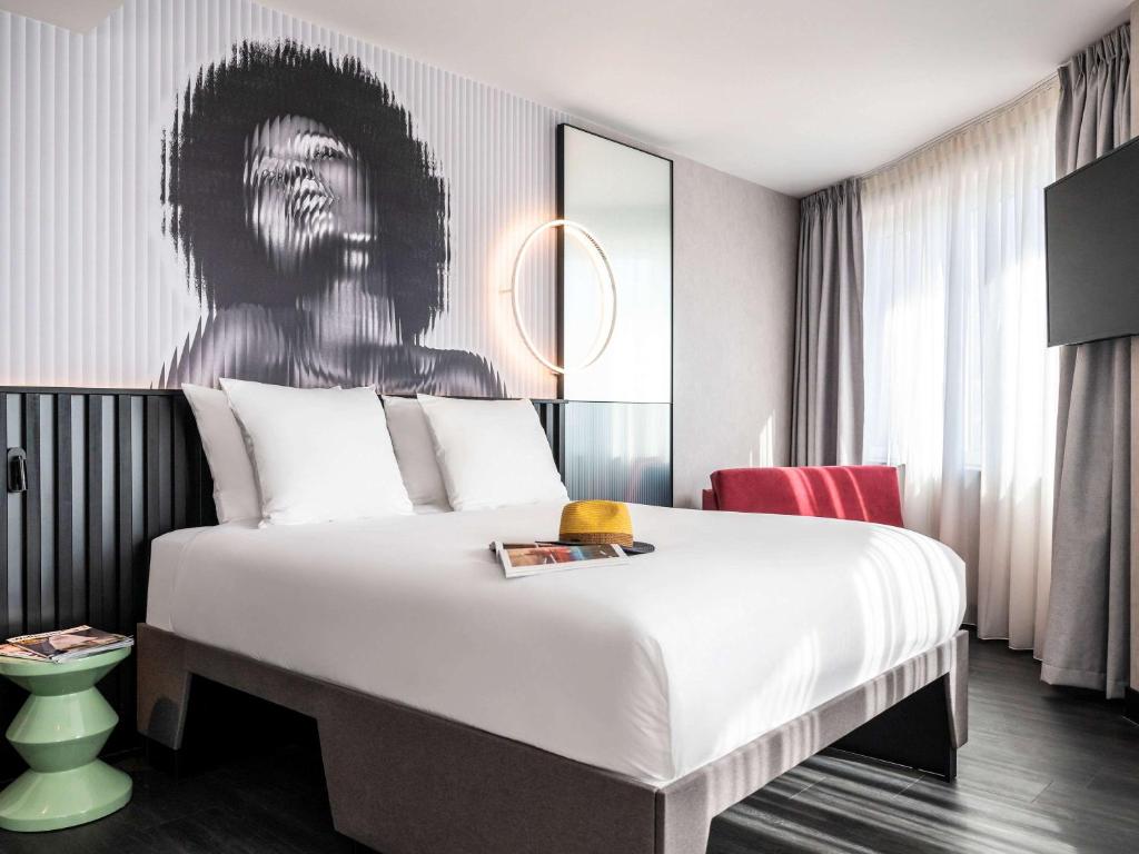 Tempat tidur dalam kamar di Tribe Amsterdam City