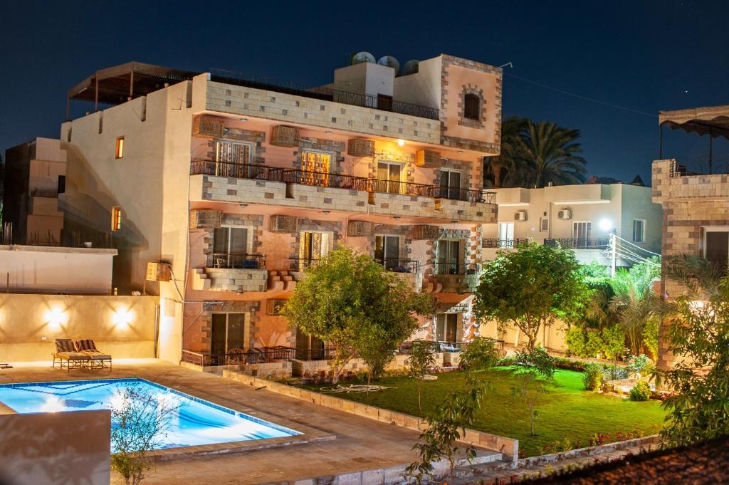 The swimming pool at or close to New Memnon Hotel