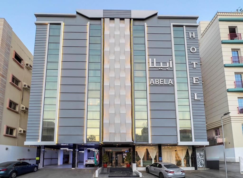 a building with a sign on the front of it at Abela Al Hamra - Palestine Street in Jeddah