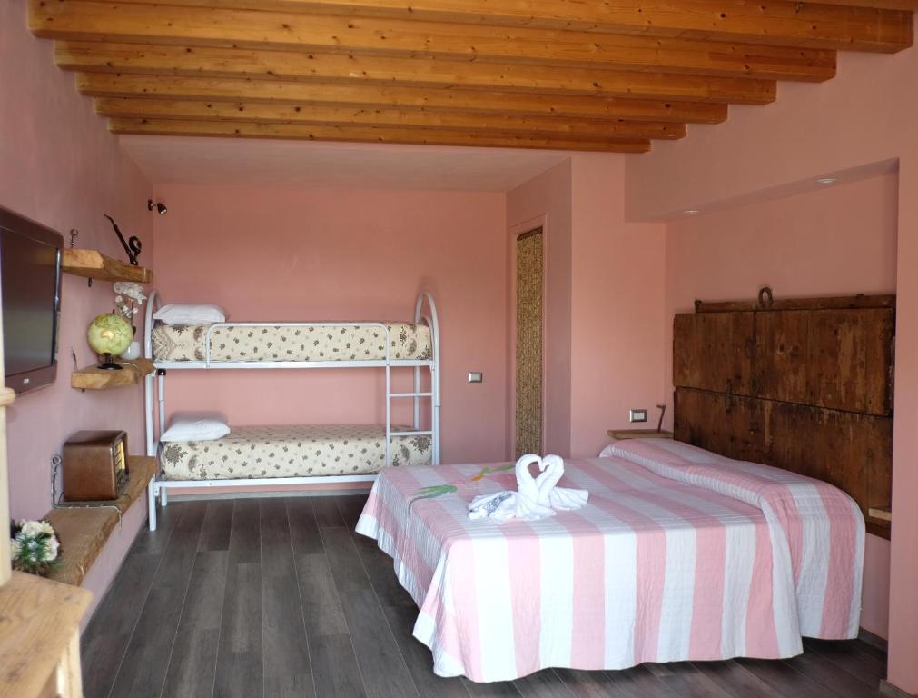 Llit o llits en una habitació de La Bosca agriturismo