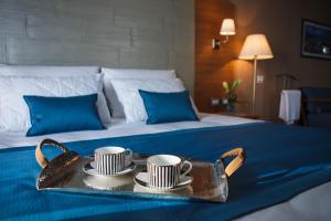 En eller flere senger på et rom på Medi Terre Boutique Hotel - By Saida Hotels