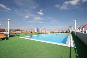 a swimming pool on the top of a cruise ship at Hotel Villa Luca in Chianciano Terme