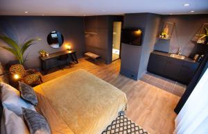 Een TV en/of entertainmentcenter bij Boutique Suites Lisse - Schiphol
