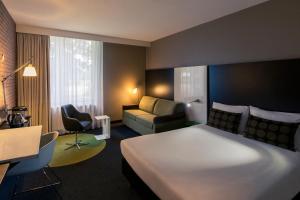 En eller flere senger på et rom på Mercure Hotel Zwolle