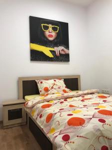 Een bed of bedden in een kamer bij Regim Hotelier Pietonală