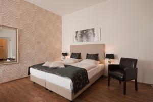 Katil atau katil-katil dalam bilik di Arthotel ANA Residence Bremen