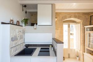 A kitchen or kitchenette at Evoca