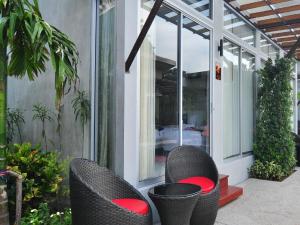 Jardin de l'établissement Phu NaNa Boutique Hotel - SHA Plus