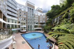 The swimming pool at or close to Le Midi Hotel Chitou