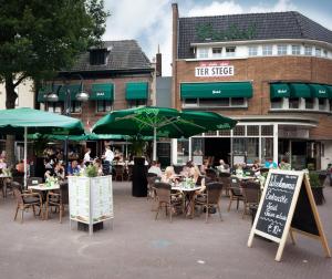 Restauracja lub miejsce do jedzenia w obiekcie Stadshotel Ter Stege