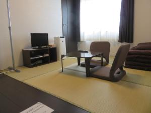 Een TV en/of entertainmentcenter bij Pirka Sapporo
