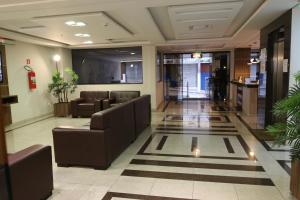 Ruang duduk di Ouro Minas Plaza Hotel