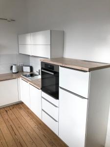 Majoituspaikan Ferienapartment Warnemünde 2 keittiö tai keittotila