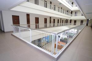 an empty hallway of a hospital with at Sukro in Bacolod