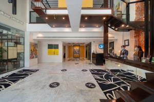 Lobbyn eller receptionsområdet på The Picasso Boutique Serviced Residences Managed by HII