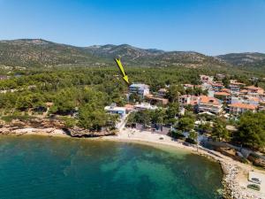 an aerial view of a resort on a beach at Hotel Sirines Complex in Potos