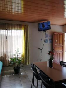 A television and/or entertainment centre at Cahuita Lodge