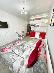 Giường trong phòng chung tại Apartment Studio PARIS 2