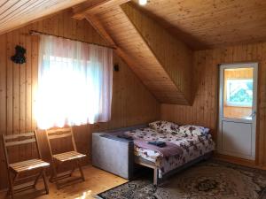 Llit o llits en una habitació de Садиба Карпатських Гір