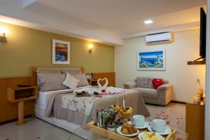 Ein Sitzbereich in der Unterkunft Hotel Santorini