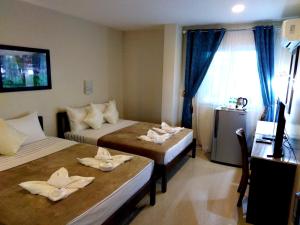 Venezia Suites Hotel Iloilo 객실 침대