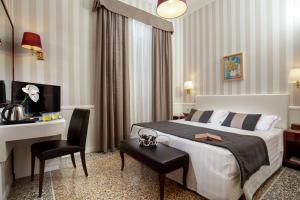 เตียงในห้องที่ Hotel Nord Nuova Roma