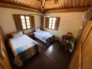 A bed or beds in a room at Jin Sha Ting Hai Homestay I