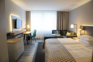 Holiday Inn Düsseldorf-Neuss, ein IHG Hotel 객실 침대