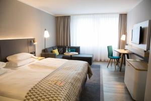 Holiday Inn Düsseldorf-Neuss, ein IHG Hotel 객실 침대