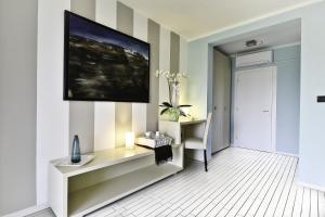 Telewizja i/lub zestaw kina domowego w obiekcie B&B Calligaris