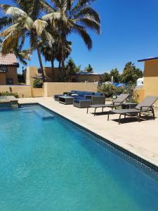 The swimming pool at or close to Mystic Breeze