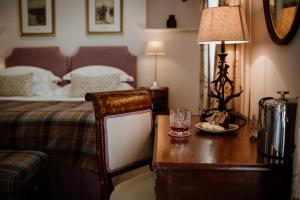 Tempat tidur dalam kamar di Links House at Royal Dornoch