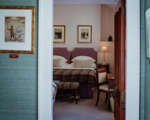 Tempat tidur dalam kamar di Links House at Royal Dornoch