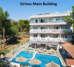 an image of a hotel with a swimming pool at Hotel Sirines Complex in Potos