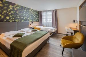 Giường trong phòng chung tại Best Western Hotel München Airport