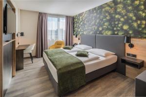 Giường trong phòng chung tại Best Western Hotel München Airport