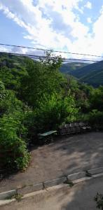 a group of benches sitting on top of a hill at Emilia in Sighnaghi