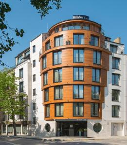 a building with a round building at mOdus Hotel in Varna City