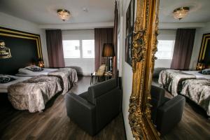 Ліжко або ліжка в номері Boutique Hotel Mustaparta