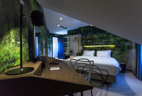 Voodi või voodid majutusasutuse Hotel Pateo - Lisbon Lounge Suites toas