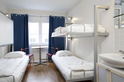 Llit o llits en una habitació de Hotel Copenhagen